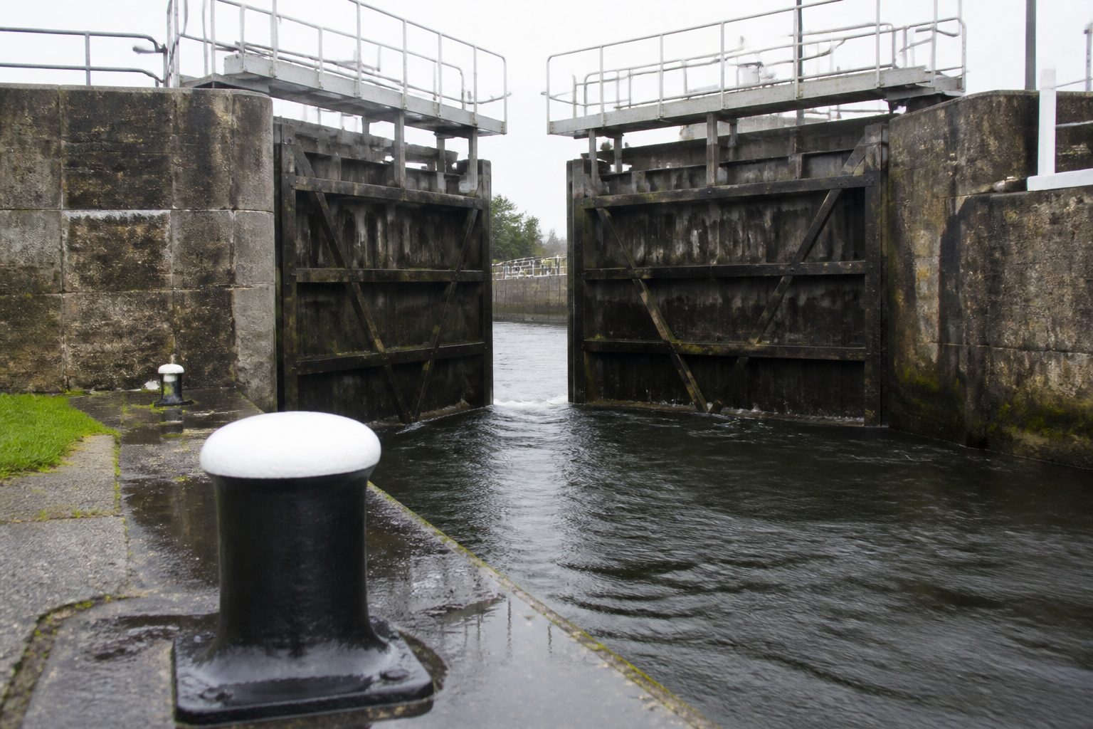 Gatún locks in daylight, a bollard in the foreground.